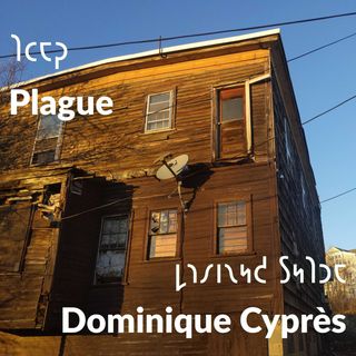 A house in disrepair against a bright blue sky